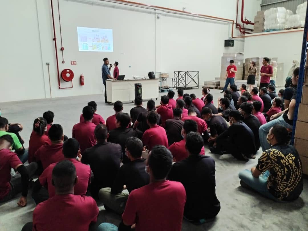Yummies Food employees gathered for the Environmental Protection and 5S Management Initiative