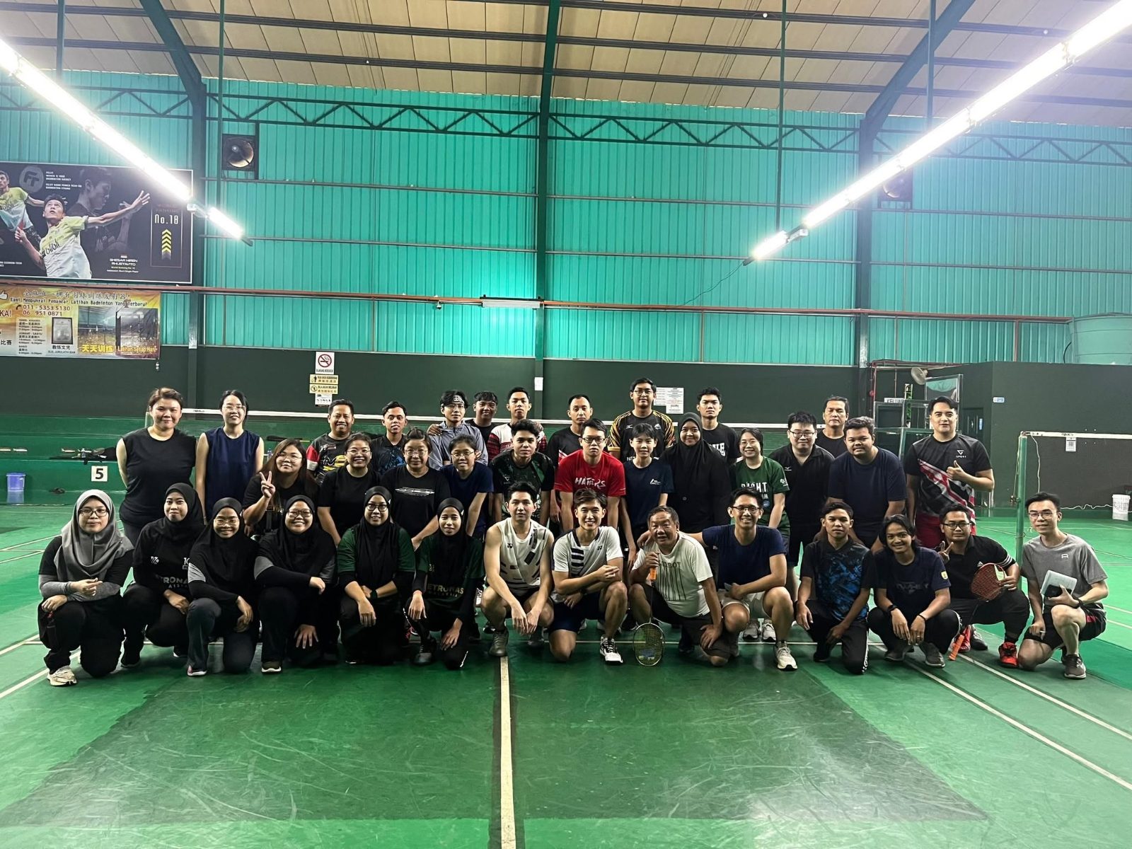 Staff group photo at the 2024 Badminton Tournament
