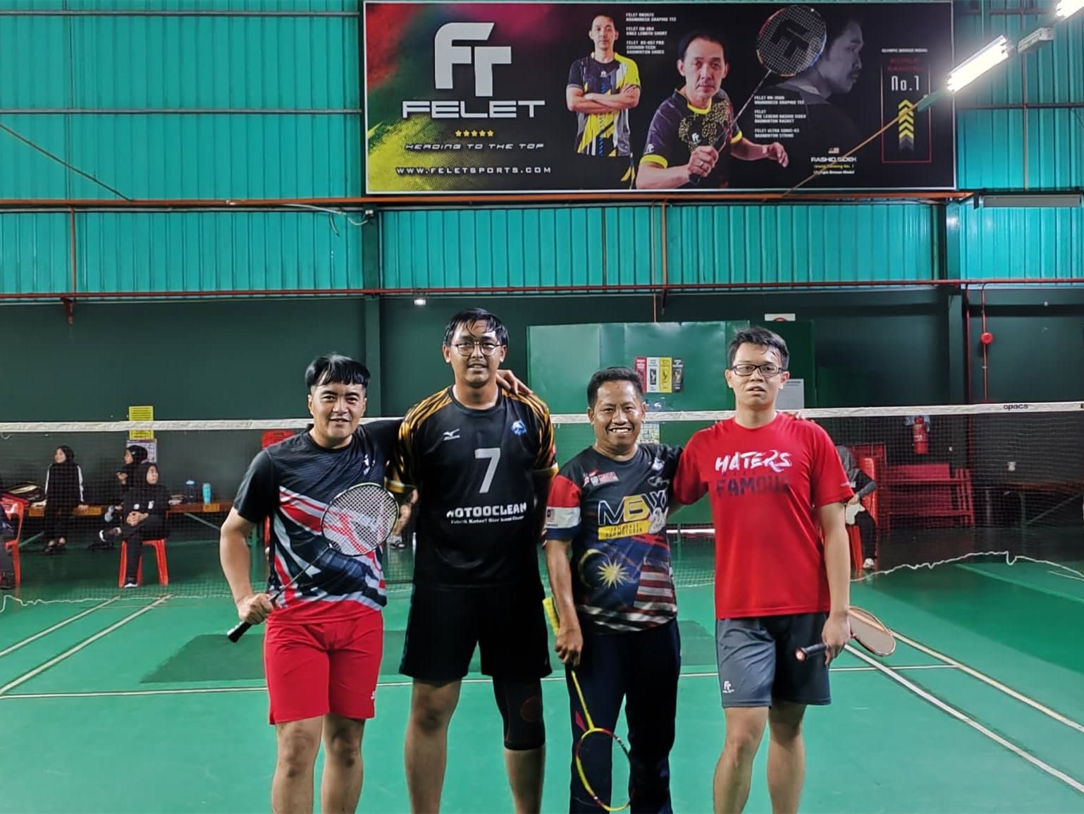 Players after a match at the 2024 staff badminton tournament